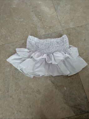 Smocked Waist Mini Skirt in Pale Pink with Ruffle Hem